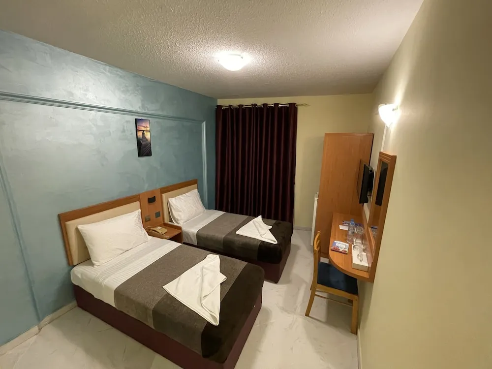 Deluxe Tek Büyük veya İki Ayrı Yataklı Oda