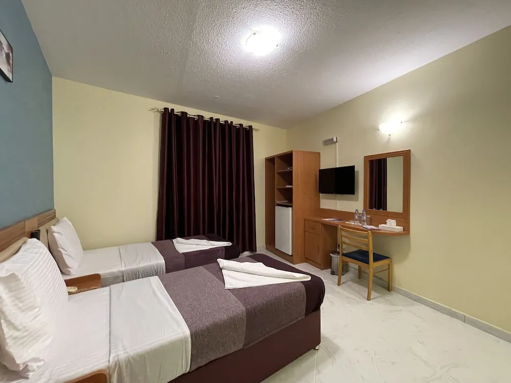 Deluxe Tek Büyük veya İki Ayrı Yataklı Oda