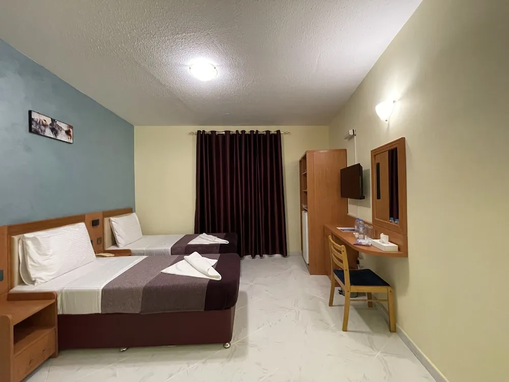 Deluxe Tek Büyük veya İki Ayrı Yataklı Oda