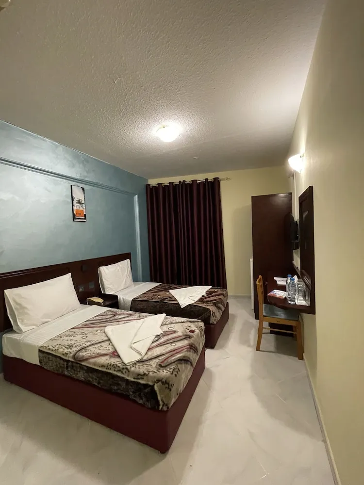 Deluxe Tek Büyük veya İki Ayrı Yataklı Oda