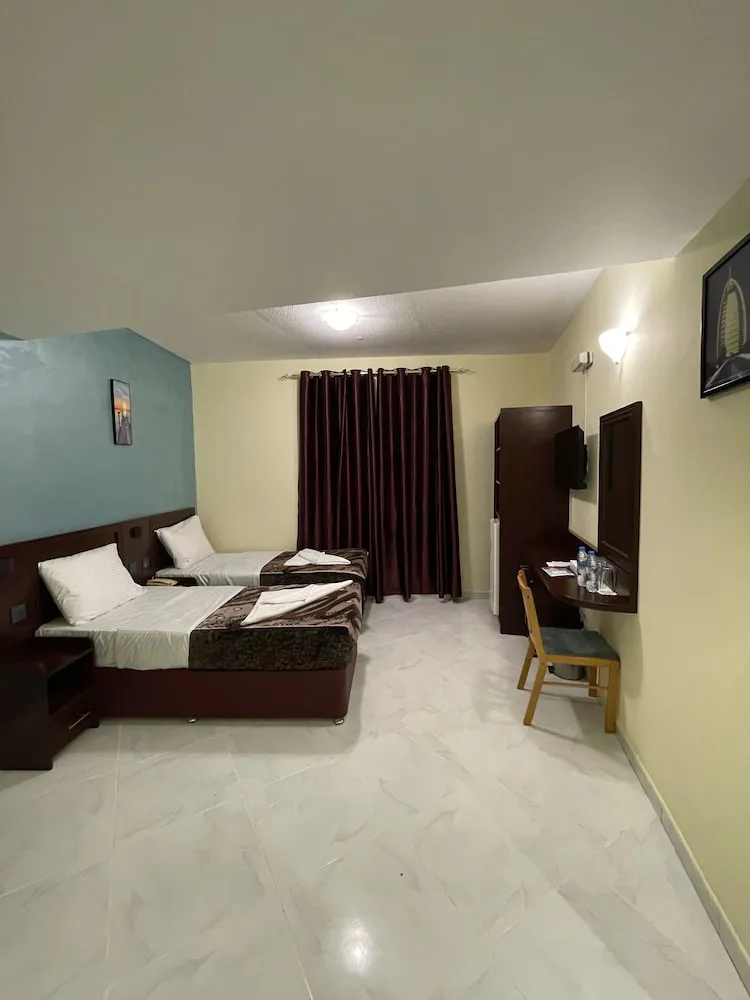 Deluxe Tek Büyük veya İki Ayrı Yataklı Oda