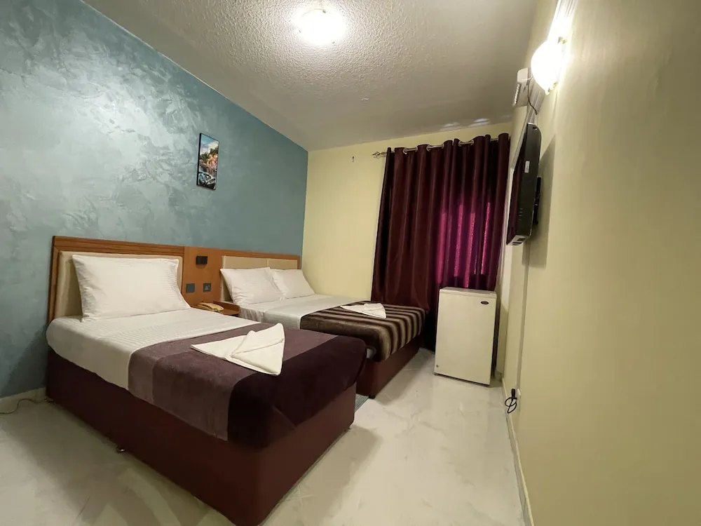 Deluxe Tek Büyük veya İki Ayrı Yataklı Oda