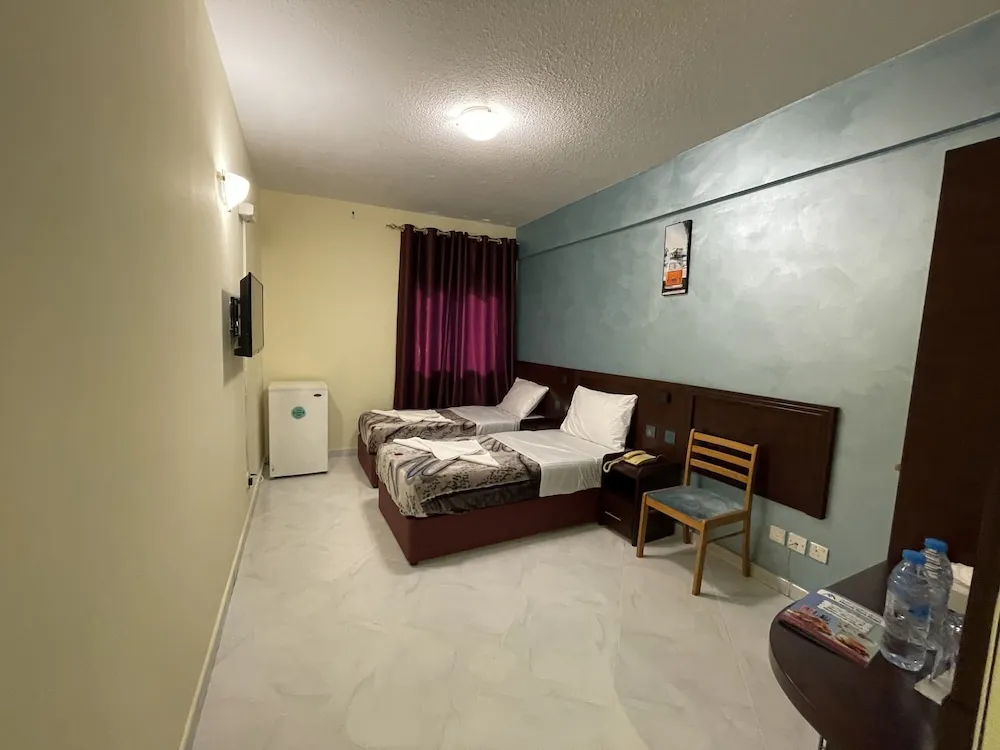 Deluxe Tek Büyük veya İki Ayrı Yataklı Oda