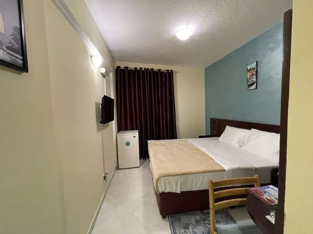 Deluxe Tek Büyük veya İki Ayrı Yataklı Oda