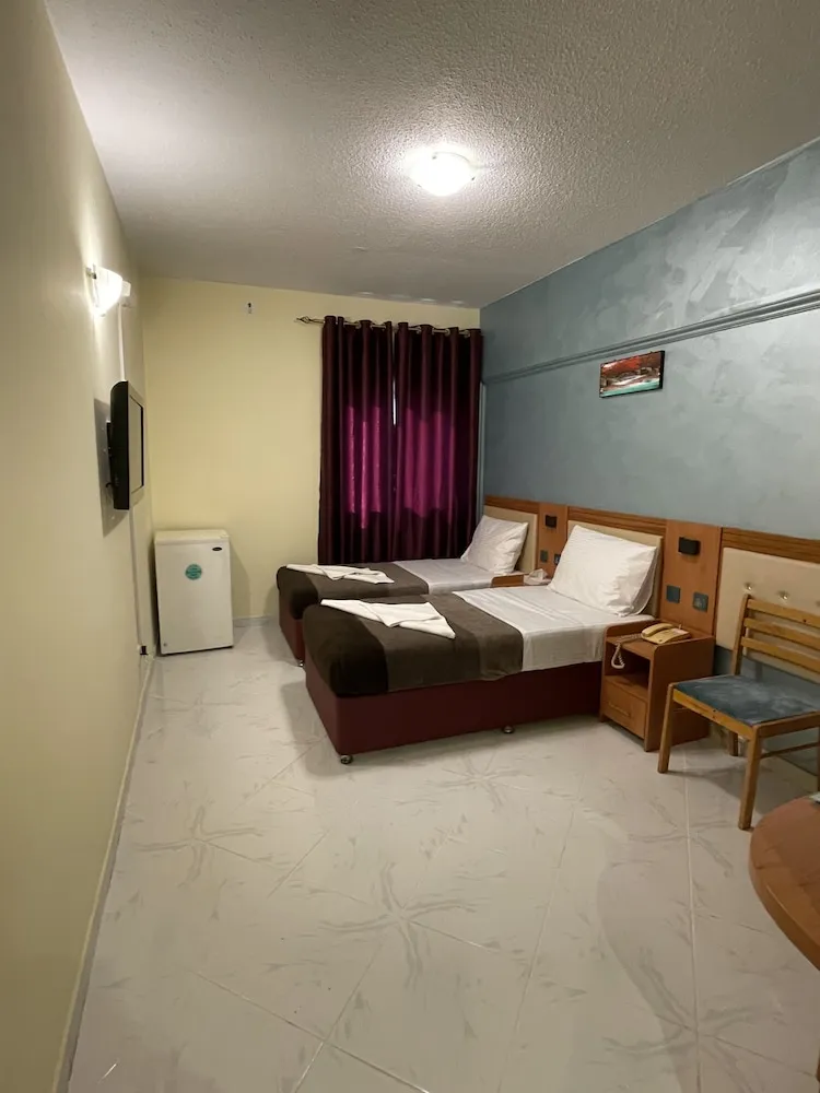 Deluxe Tek Büyük veya İki Ayrı Yataklı Oda