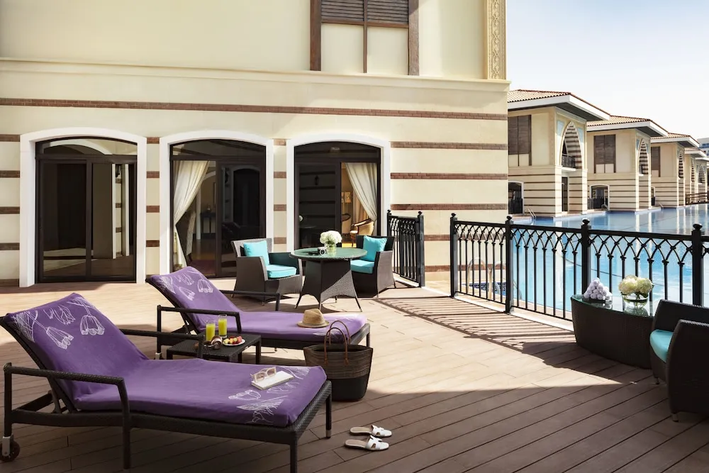 Four Bedroom Royal Villa, direct lagoon pool access, butler, daily breakfast & airport transfer