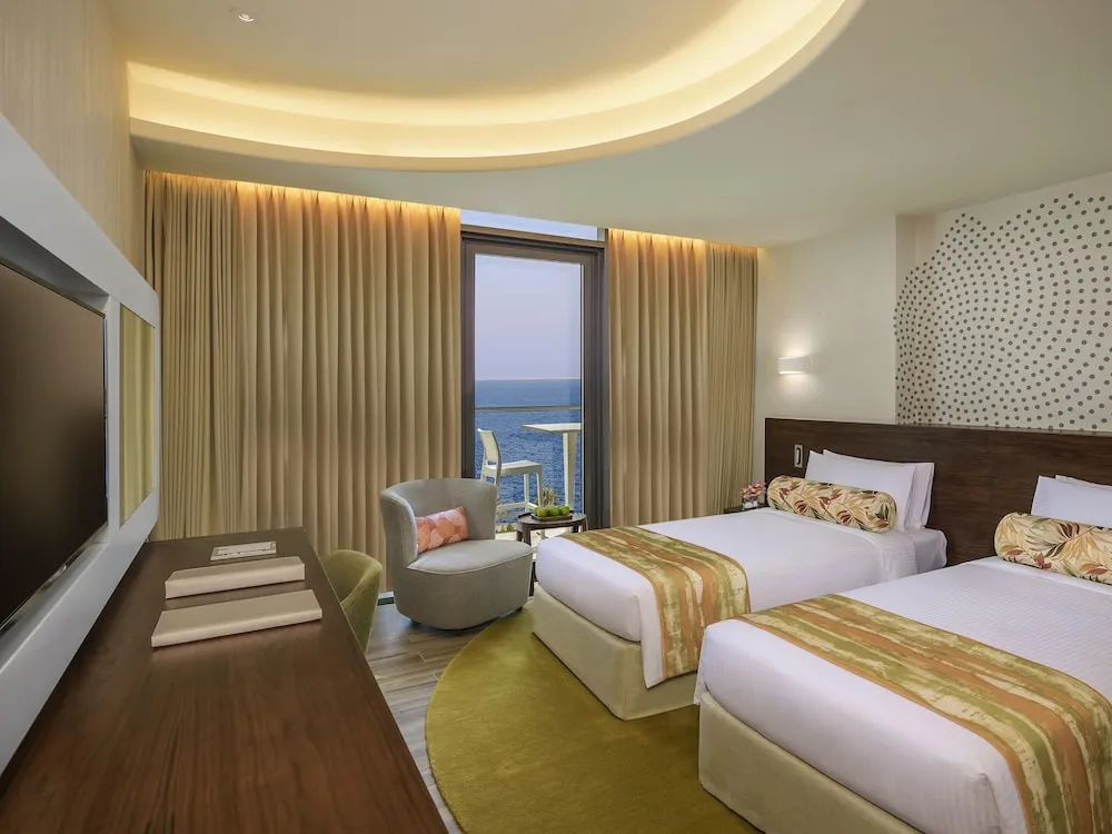 Deluxe Room with Balcony, Partial Palm Sea View