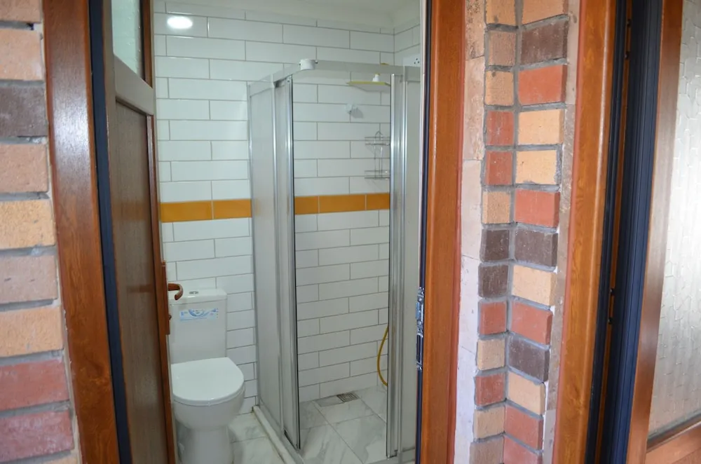 Standard Dört Kişilik Oda, Bahçe Manzaralı