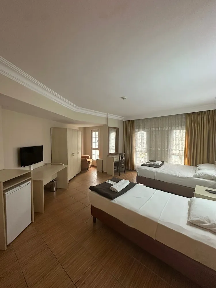 Family Üç Kişilik Oda