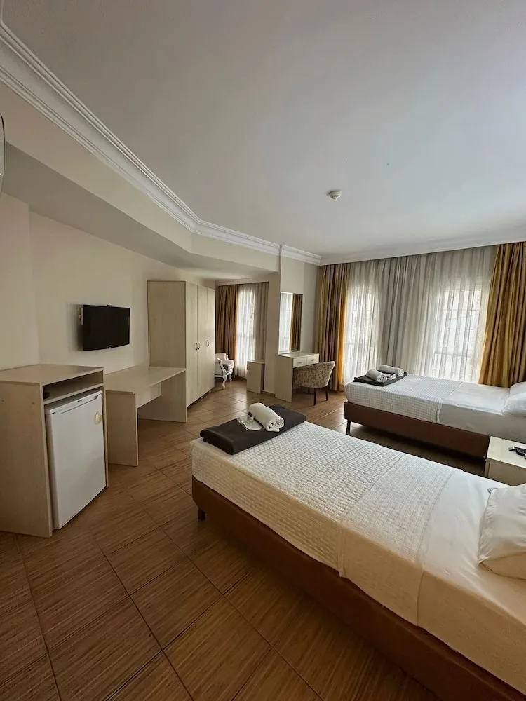 Family Üç Kişilik Oda