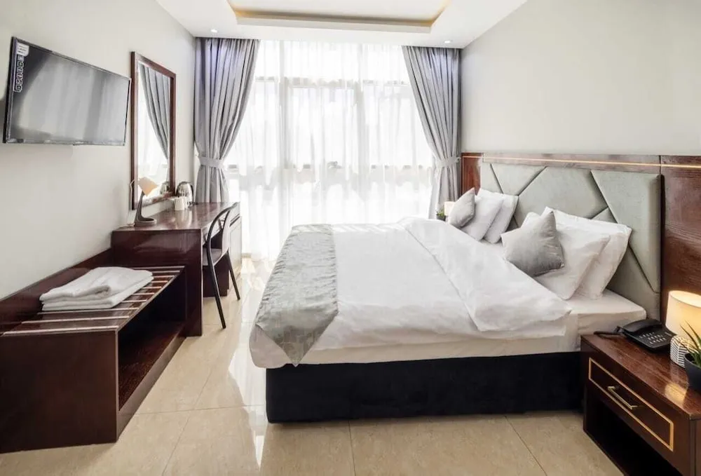 Deluxe Tek Büyük veya İki Ayrı Yataklı Oda