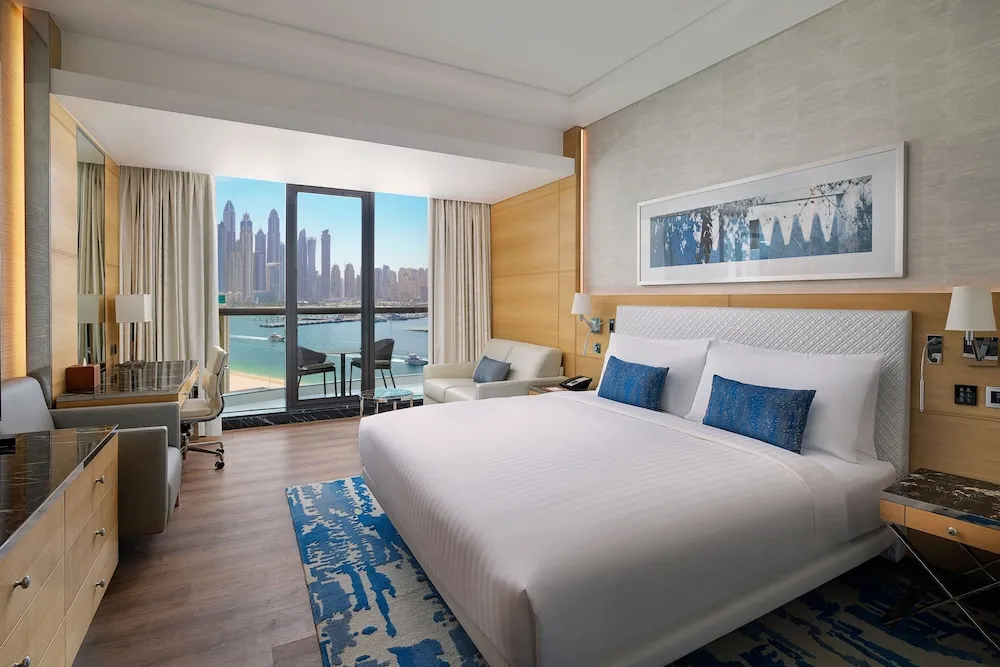 Palm Sea View Room with King Bed and Sofa Bed Private Balcony, Direct Access to Beach