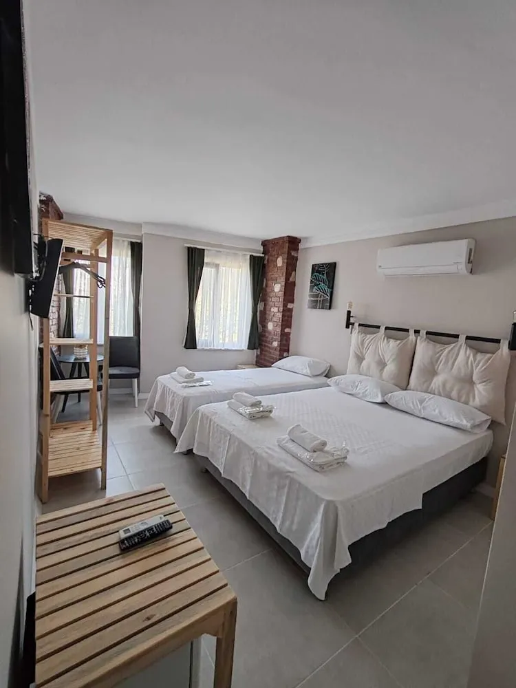 Deluxe Üç Kişilik Oda