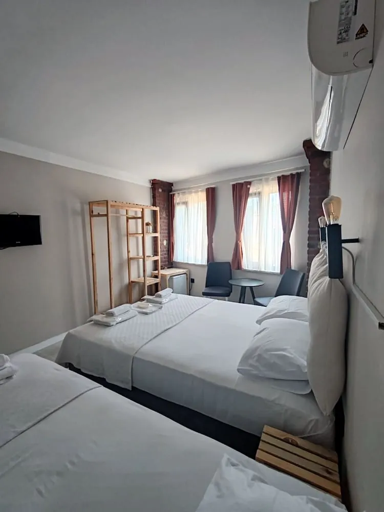 Deluxe Üç Kişilik Oda