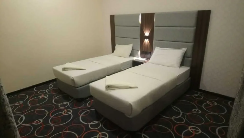 Deluxe Tek Büyük veya İki Ayrı Yataklı Oda