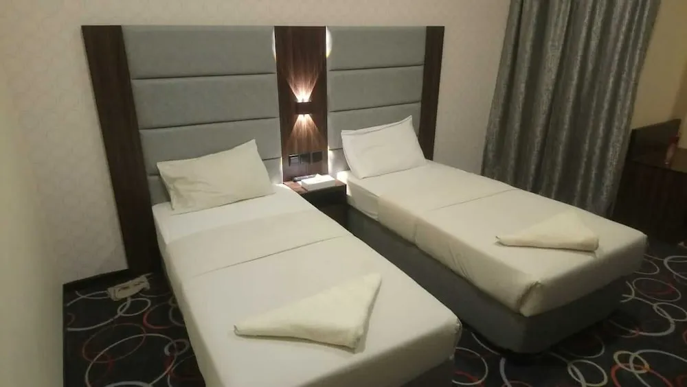 Deluxe Tek Büyük veya İki Ayrı Yataklı Oda