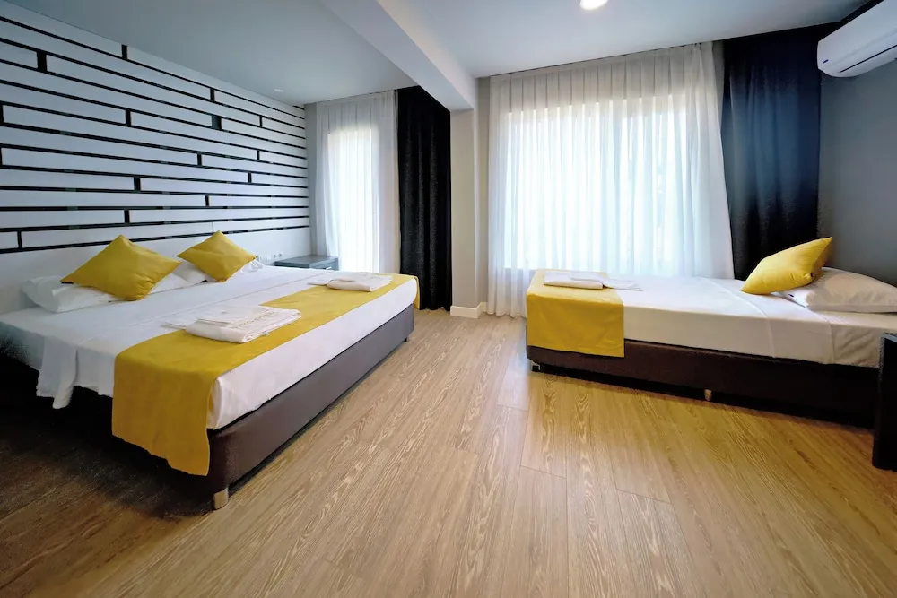 Deluxe Üç Kişilik Oda