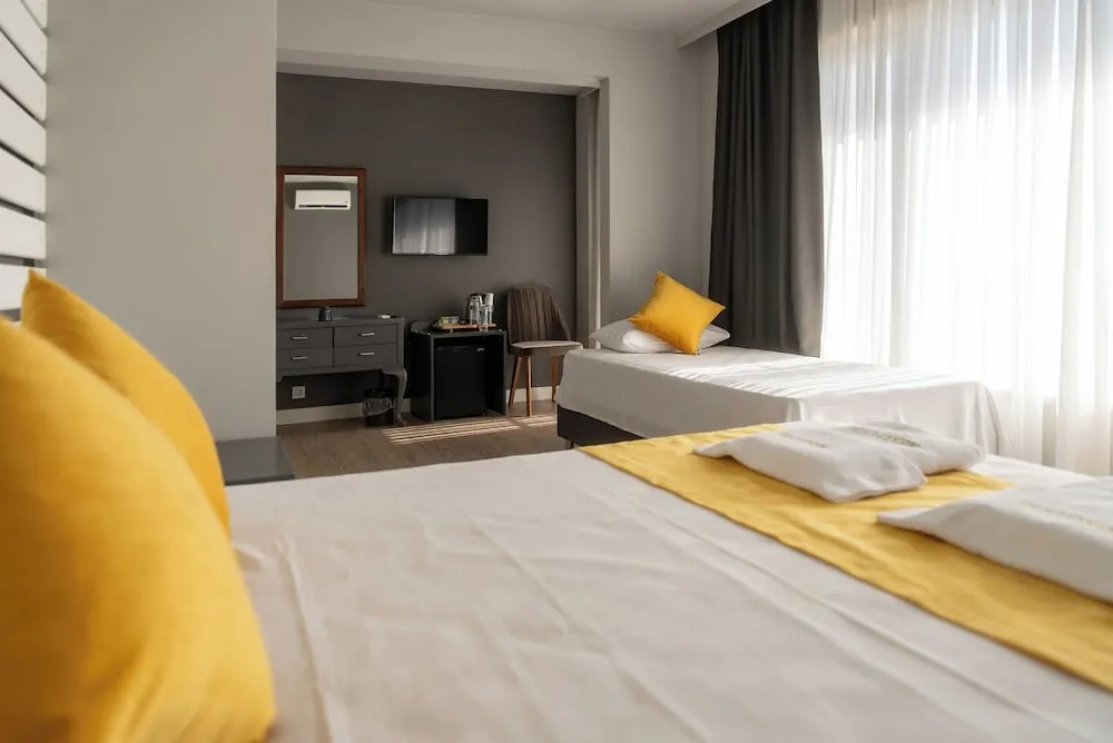Deluxe Üç Kişilik Oda