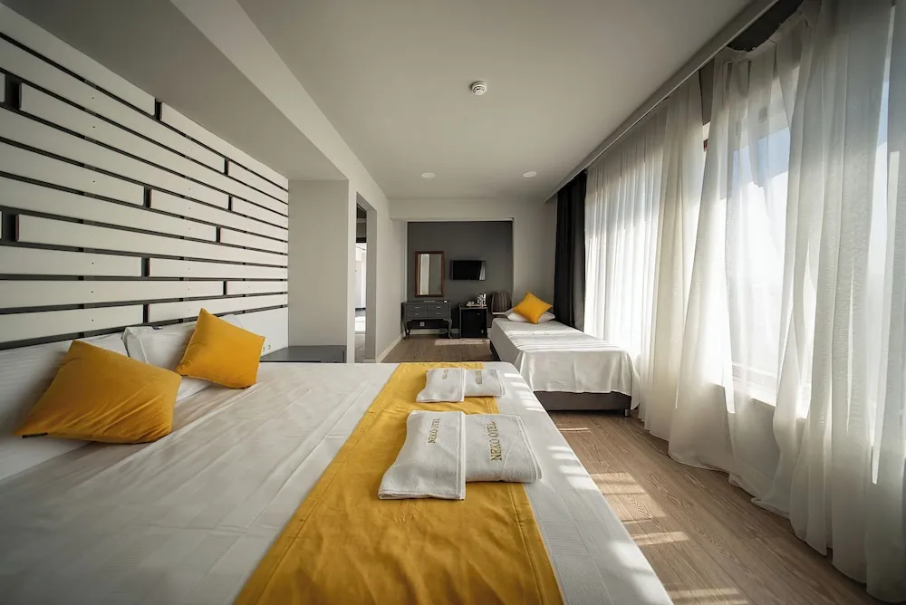 Deluxe Üç Kişilik Oda