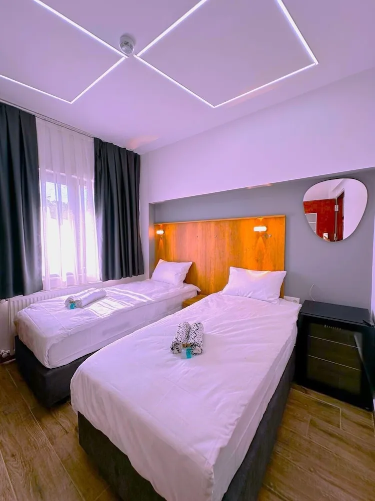 Deluxe Üç Kişilik Oda