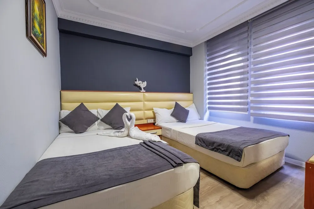 Deluxe Üç Kişilik Oda