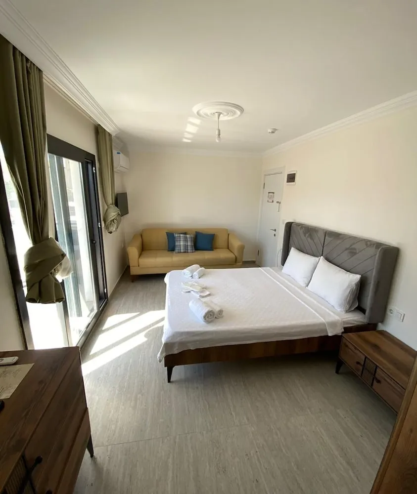 Deluxe Dört Kişilik Oda, Balkon, Bahçe Manzaralı