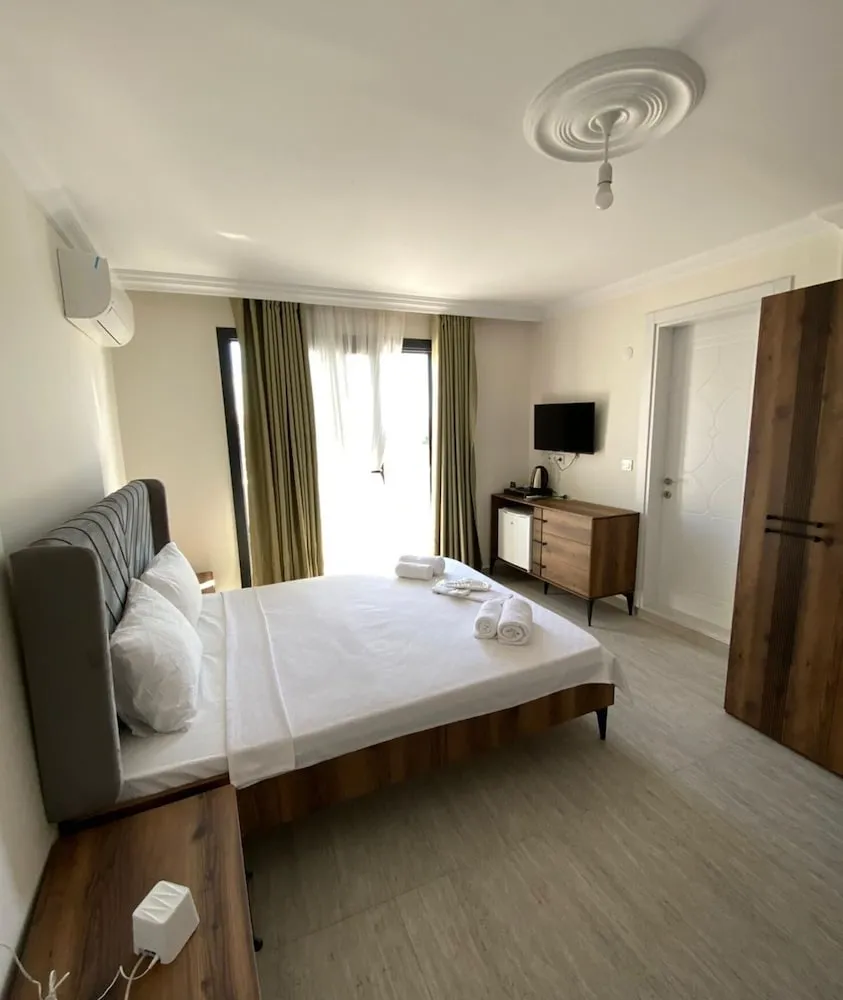 Family Üç Kişilik Oda, Balkon, Bahçe Manzaralı