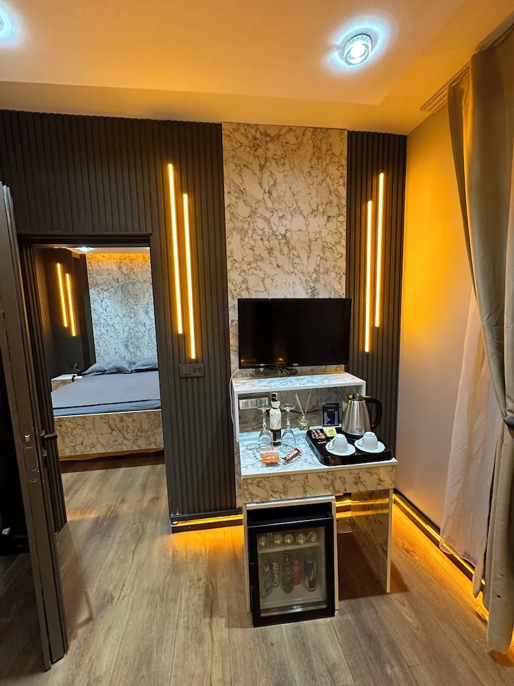 Deluxe Dört Kişilik Oda, Balkon, Şehir Manzaralı