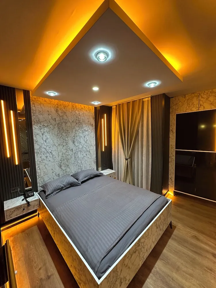 Deluxe Dört Kişilik Oda, Balkon, Şehir Manzaralı