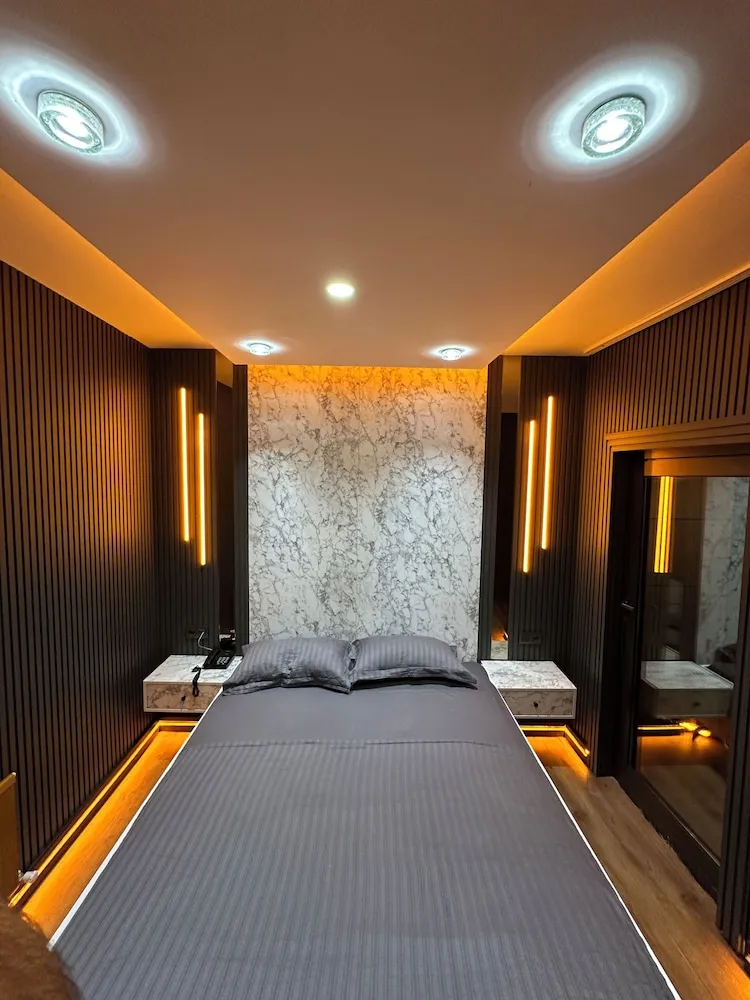 Deluxe Dört Kişilik Oda, Balkon, Şehir Manzaralı