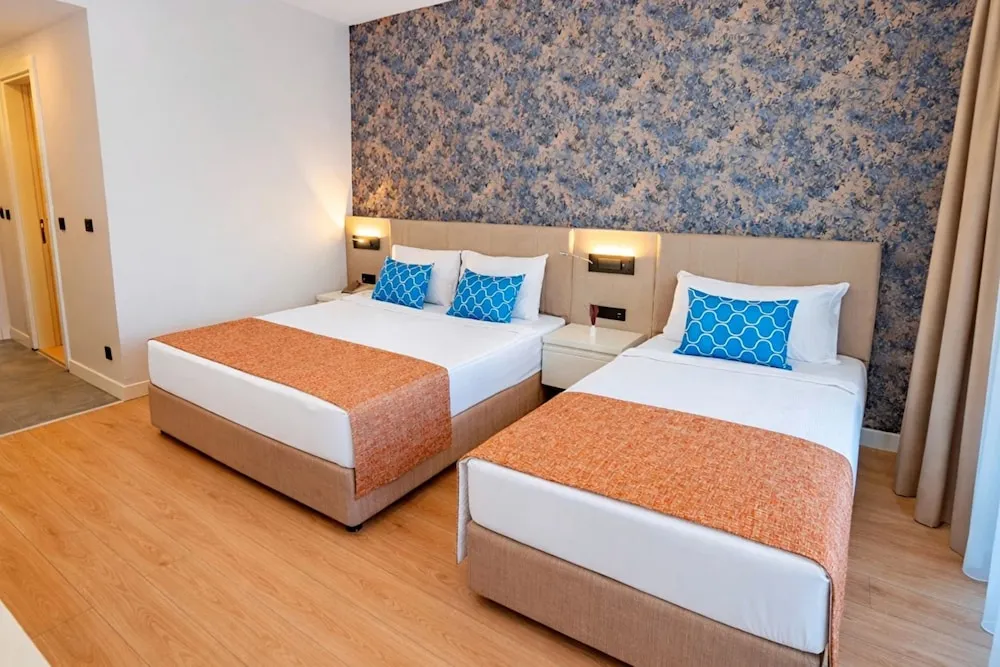 Standard Triple Room with Balcony