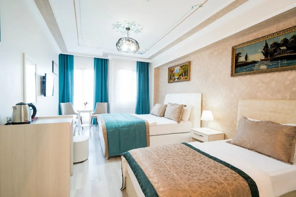 Family Üç Kişilik Oda