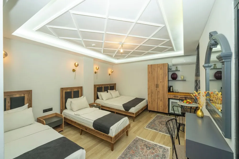 Deluxe Dört Kişilik Oda