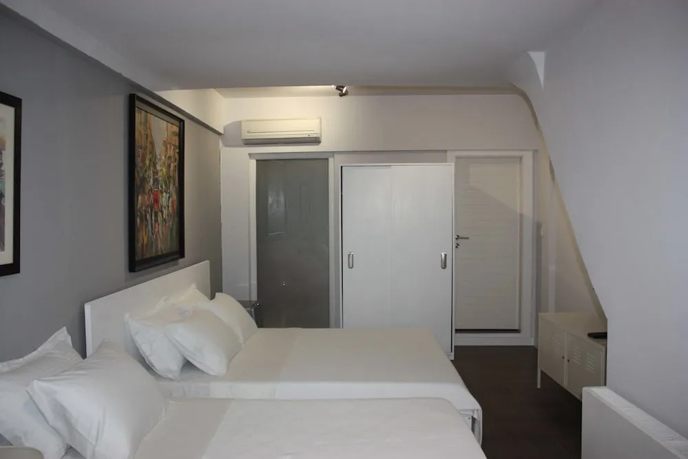 Deluxe Üç Kişilik Oda