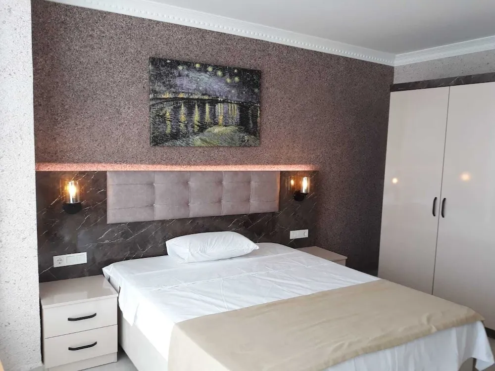 Deluxe Tek Büyük Yataklı Oda, Balkon, Deniz Manzaralı