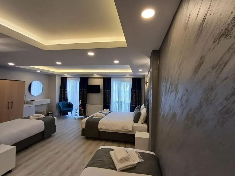 Deluxe Dört Kişilik Oda, Deniz Manzaralı