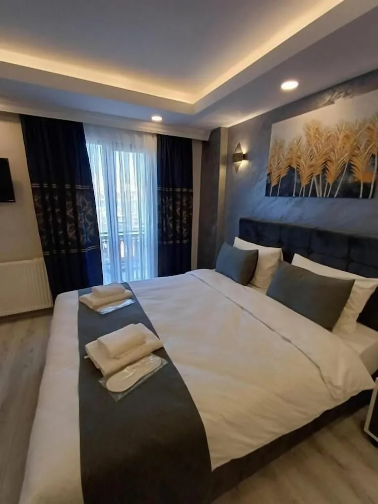 Deluxe Dört Kişilik Oda, Deniz Manzaralı