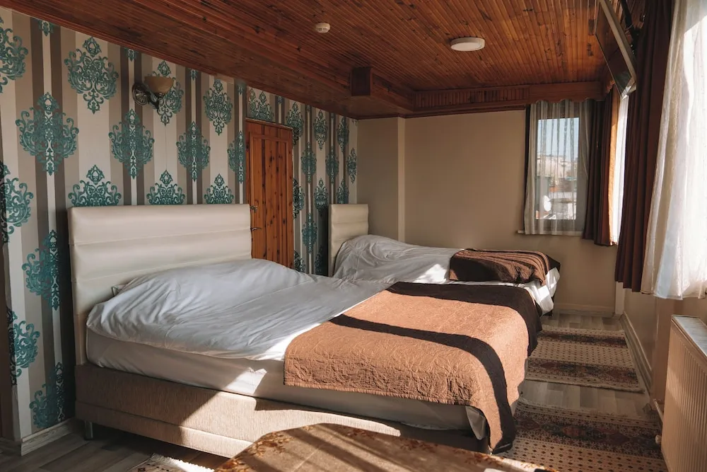 Deluxe Üç Kişilik Oda, Deniz Manzaralı