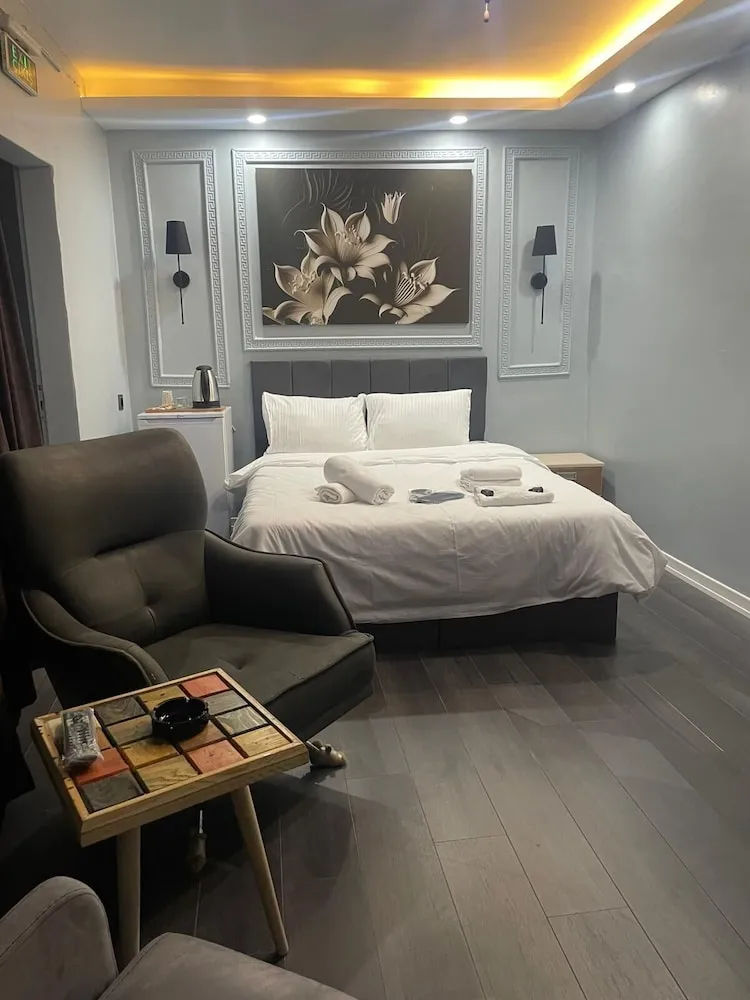 Deluxe Tek Büyük veya İki Ayrı Yataklı Oda