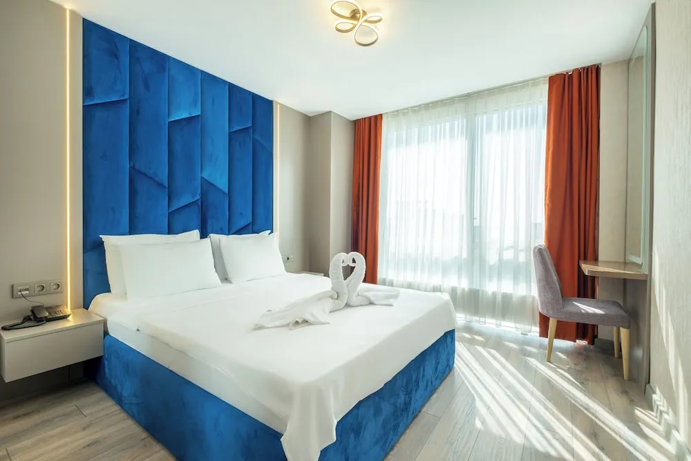 Deluxe Dört Kişilik Oda, Deniz Manzaralı