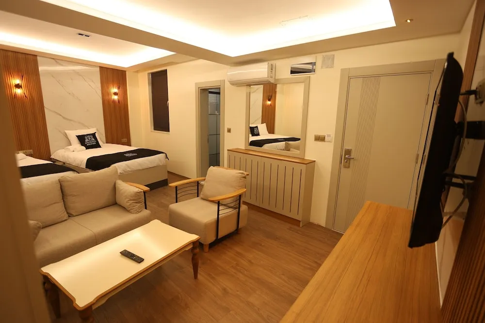 Deluxe Üç Kişilik Oda