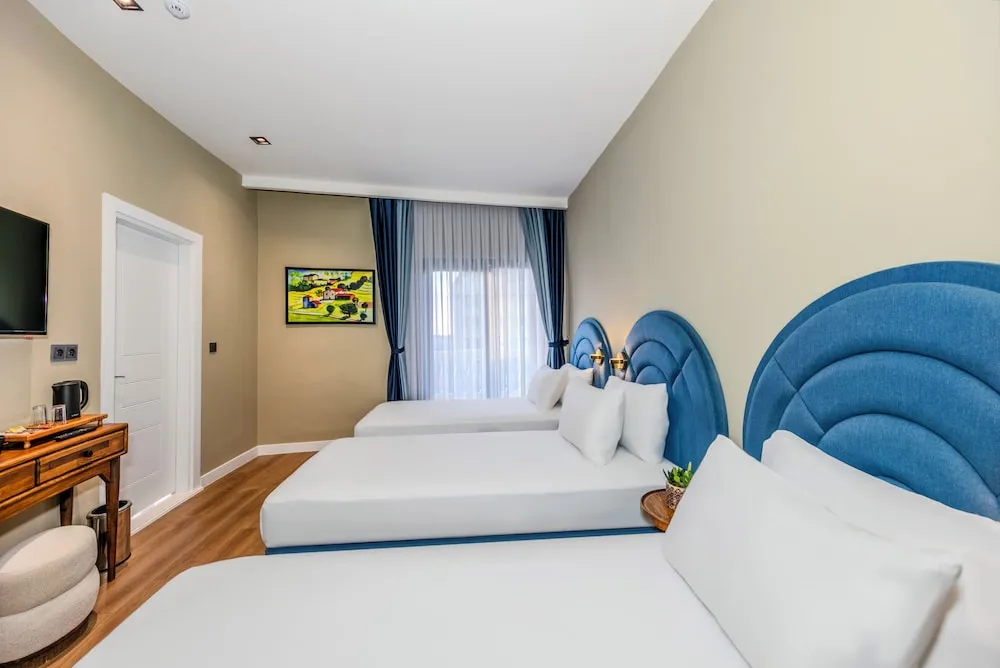 Deluxe Üç Kişilik Oda, 3 Tek Kişilik Yatak, Balkon