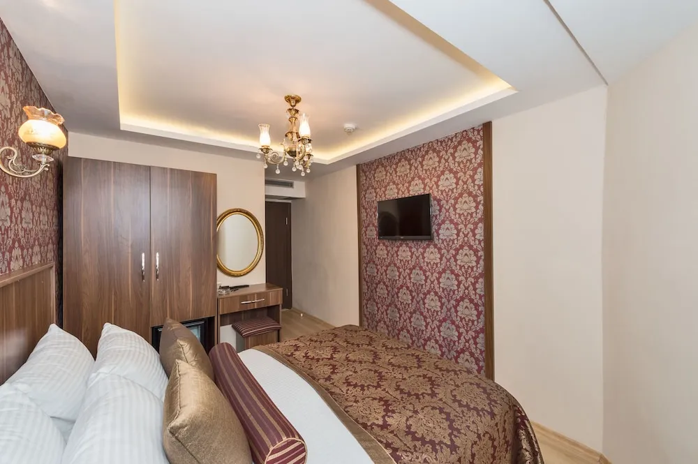 Deluxe Tek Büyük veya İki Ayrı Yataklı Oda