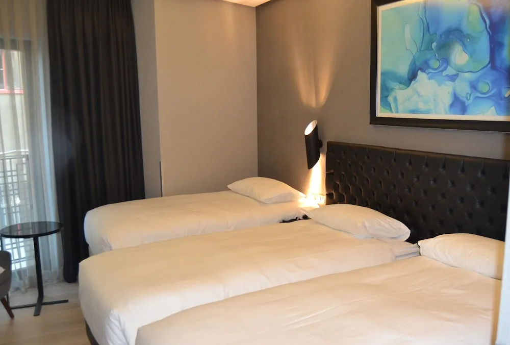 Deluxe Üç Kişilik Oda, 3 Tek Kişilik Yatak