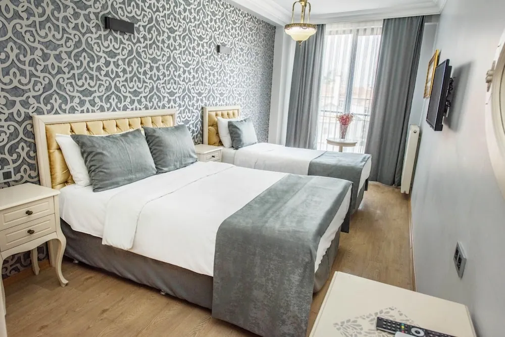 Deluxe Üç Kişilik Oda