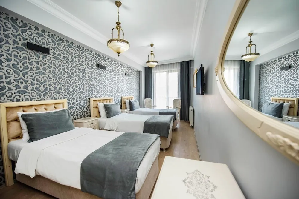 Deluxe Üç Kişilik Oda