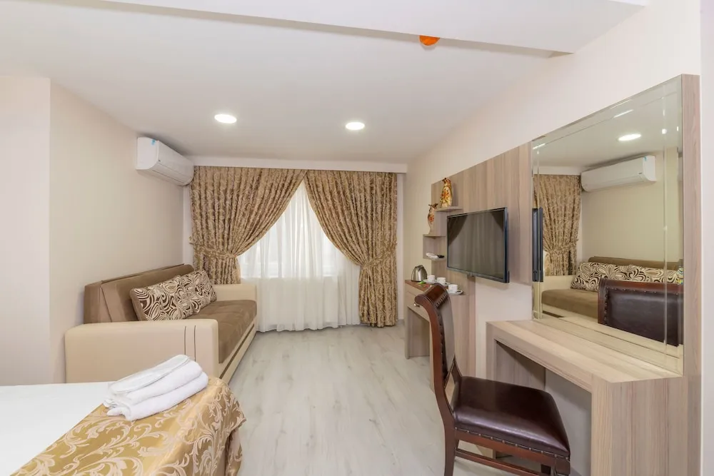 Grand Üç Kişilik Oda