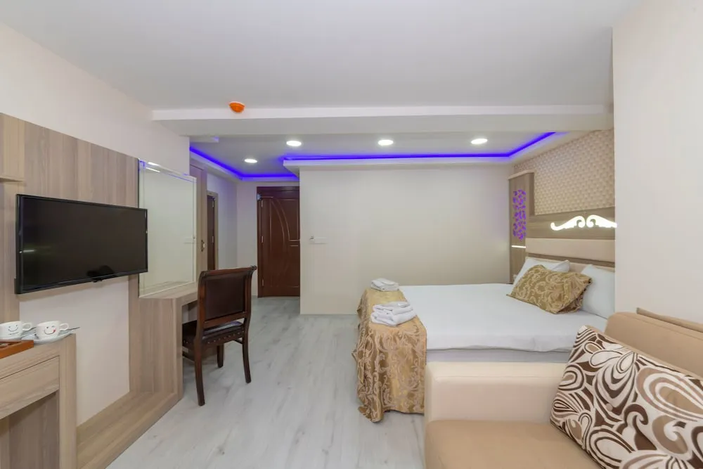 Grand Üç Kişilik Oda