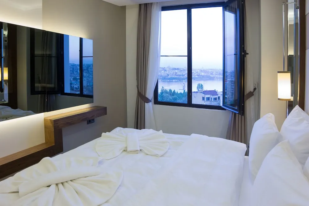 Deluxe Üç Kişilik Oda, Deniz Manzaralı