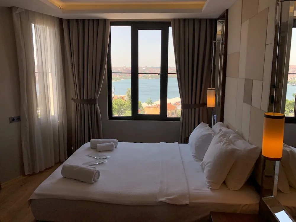 Deluxe Üç Kişilik Oda, Deniz Manzaralı